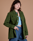 Alex is 5'8" and wearing XXS Ripstop Field Coat in Evergreen