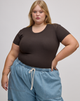 Juliet is 5'7" and wearing L Baby Tee in Espresso Brown