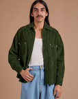 Anthony is 5'6" and wearing S Cropped Corduroy Overshirt in Evergreen