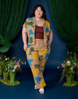 Ashley is 5'7" and wearing 1XL Paintstamped Work Pants in Froggy
paired with matching Pantry Button-Up