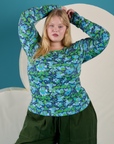 Juliet is 5’7” and wearing L Long Sleeve Baby Tee in Angel Print