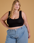 Juliet is 5’7” and wearing L Mini Tank in Basic Black