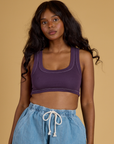 Kandia is 5’3” and wearing P Contrast Stitch Mini Tank in Nebula Purple