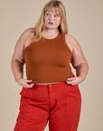 Juliet is 5’7” and wearing L Racerback Tank in Burnt Terracotta