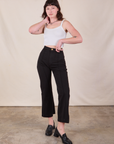 Alex is 5'8" and wearing XS Western Pants in Basic Black paired with a Cami in vintage tee off-white