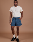 Isaac is 5’10” and wearing M Classic Work Shorts in French Blue paired with Organic Vintage Tee in Vintage Off-White