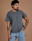 Jesse is 5'8" and wearing S Burly Tee in Washed Grey