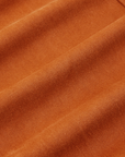 Short Sleeve Jumpsuit in Burnt Terracotta fabric detail close up