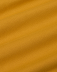 Cropped Tank Top in Mustard Yellow fabric detail close up