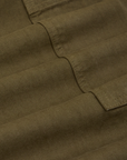 Drop Pocket Cargo Pants in Surplus Green fabric detail close up