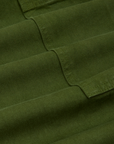 Drop Pocket Cargo Pants in Evergreen fabric detail close up
