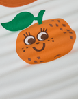 Produce Raglan Tee in Orange close up. Illustrated orange character.