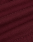 Pleated Trouser Shorts in Red Wine fabric detail close up