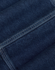 Mid-Rise Carpenter Jeans in Dark Wash fabric detail close up