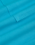 Longline Work Shorts in Hawaiian Blue fabric detail close up