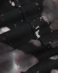Magic Waters Drop Pocket Pants in Ink Blot fabric detail close up. Black, white and shades of grey tie dye.