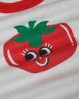 Produce Raglan Tee in Tomato close up. Illustrated tomato character with smiley face