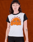 Alex is 5'8" and wearing P Anniversary Tee in Smile