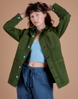 Alex is wearing Ripstop Field Coat in Evergreen