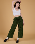 Corduroy Drop Pocket Cargo Pants in Evergreen and Cropped Tank in Vintage Tee White on Alex
