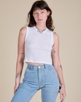 Alex is wearing Muscle Tee in Vintage Tee White