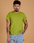 Jesse is wearing Organic Vintage Tee in Gross Green