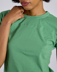 Close up of Jr. Varsity Tee in Seafoam Green on Kira