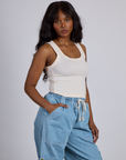 Angled front view of The Tank Top in Vintage Tee Off-White on Kandia