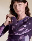 Angled front view close up of Long Sleeve Baby Tee in Dark Lavender on Alex