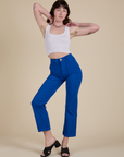 Alex is wearing Work Pants in Royal Blue and vintage tee white Cropped Tank