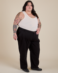 Angled front view of Work Pants in Basic Black and Tank Top in Vintage Tee Off-White on Sam