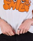 Anniversary Tee in Smile front close up on Alex
