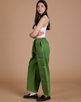 Denim Drop Pocket Pants in Green Overdye side view on Anjaline
