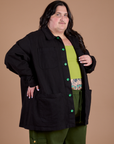 Angled front view of Ripstop Field Coat in Basic Black on Sam