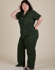 Angled front view of Short Sleeve Jumpsuit in Swamp Green on Ashley