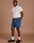 Angled front view of Classic Work Shorts in French Blue and Organic Vintage Tee in Vintage Off-White