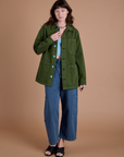Alex is wearing Ripstop Field Coat in Evergreen paired with french blue Drop Pocket Cargo Pants