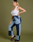 Side view of Mismatched Denim Carpenter Jeans and Cropped Tank in Vintage Tee White on Tiara
