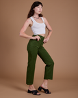 Side view of Organic Work Pants in Evergreen on Alex