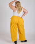 Drop Pocket Cargo Pants in Sunshine Yellow back view on Juliet