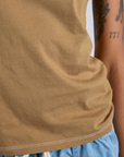 Jr. Varsity Tee in Desert Brown bottom close up on Kira