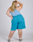 Longline Work Shorts in Hawaiian Blue back view on Juliet