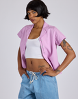 Angled front view of Pantry Button-Up in Lilac Purple with a Cropped Tank in Vintage Tee White underneath