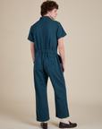 Short Sleeve Jumpsuit in Lagoon back view on Quinn