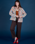 Sydney is wearing and Stripe Work Jacket in Rainbow Stripe espresso brown Work Pants
