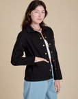 Angled front view of Work Jacket in Basic Black on Alex