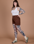 Angled front view of Classic Work Shorts in Fudgesicle Brown and Cropped Tank in Vintage Tee White on Sydney