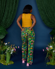 Back view of Work Pants in Pond Party and mustard yellow Cropped Tank on Kandia