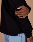 sleeve close up of Long Sleeve Burly Tee in Basic Black on Jerrod