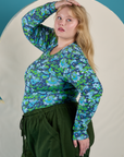 Side view of Long Sleeve Baby Tee in Angel Print on Juliet